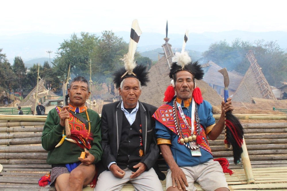 Naga elders in traditional attire during the Hornbill Festival at Kisama. (Morung Photo)